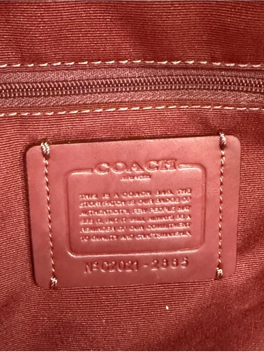 Coach Black Leather Backpack with Red Star Motif and Red Trim